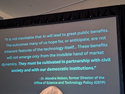 Slide from Rebekah Cummings's plenary showing library values in contrast with commercial AI defaults